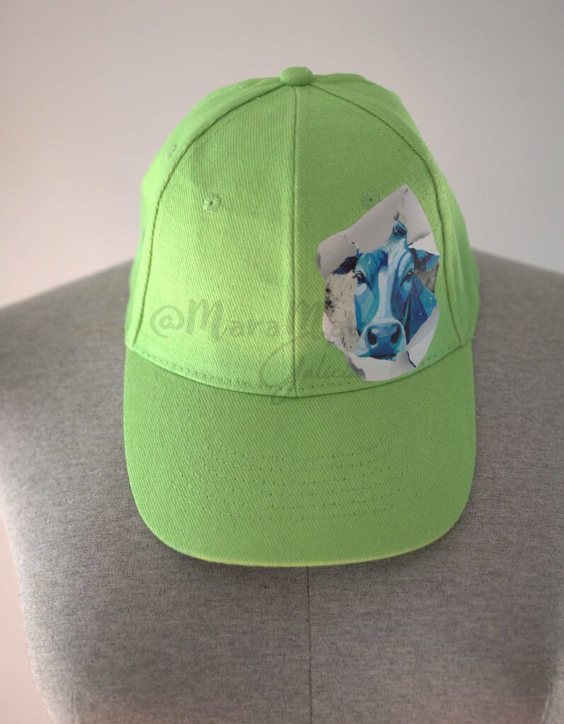Gorra-Kid-Trnt-verde manzana con parche de una vaca en tonos azules
