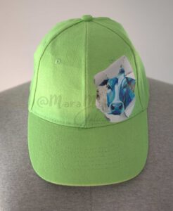 Gorra-Kid-Trnt-verde manzana con parche de una vaca en tonos azules